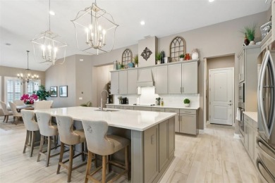 Experience luxury living in this stunning custom home in Amelia on Amelia National Golf and Country Club in Florida - for sale on GolfHomes.com, golf home, golf lot