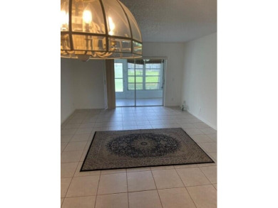 HIGHLY DESIRABLE 1ST FLOOR w/SERENE LAKE VIEWS* 2/2 HOME IN AN on Delray Beach Golf Club in Florida - for sale on GolfHomes.com, golf home, golf lot