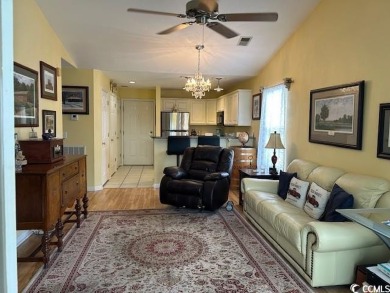 This corner unit golf course condo is tucked away in a serene on True Blue Plantation in South Carolina - for sale on GolfHomes.com, golf home, golf lot