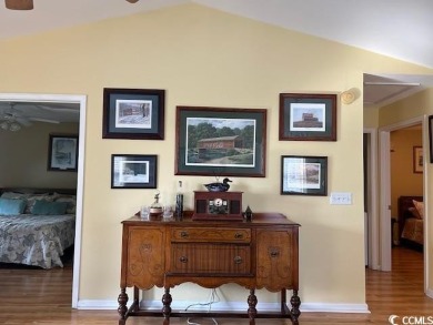 This corner unit golf course condo is tucked away in a serene on True Blue Plantation in South Carolina - for sale on GolfHomes.com, golf home, golf lot