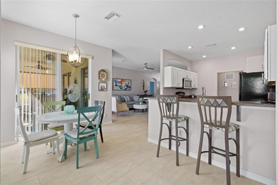 Experience the Florida lifestyle in this beautifully maintained on Summerglen Country Club in Florida - for sale on GolfHomes.com, golf home, golf lot