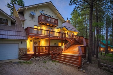 Magic in the Angel Fire Forest ~ This extraordinary Angel Fire on Angel Fire Resort Country Club in New Mexico - for sale on GolfHomes.com, golf home, golf lot