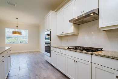 WELCOME TO THIS SOUGHT-AFTER SUMMERVILLE MODEL! This 3-bedroom on Esplanade Golf and Country at Lakewood Ranch in Florida - for sale on GolfHomes.com, golf home, golf lot