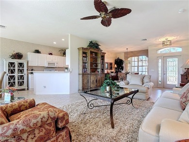 This beautifully maintained Sandpiper home in HERONS GLEN on Herons Glen Golf and Country Club in Florida - for sale on GolfHomes.com, golf home, golf lot