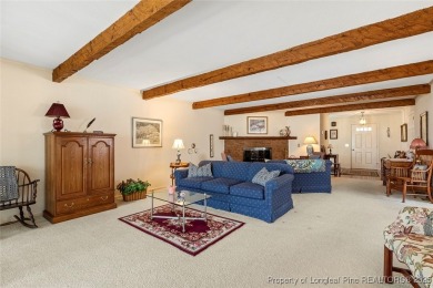 Say *Welcome Home* to this adorable English cottage-style home on Carolina Trace Country Club in North Carolina - for sale on GolfHomes.com, golf home, golf lot