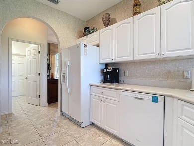 This beautifully maintained Sandpiper home in HERONS GLEN on Herons Glen Golf and Country Club in Florida - for sale on GolfHomes.com, golf home, golf lot