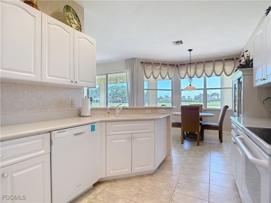 This beautifully maintained Sandpiper home in HERONS GLEN on Herons Glen Golf and Country Club in Florida - for sale on GolfHomes.com, golf home, golf lot
