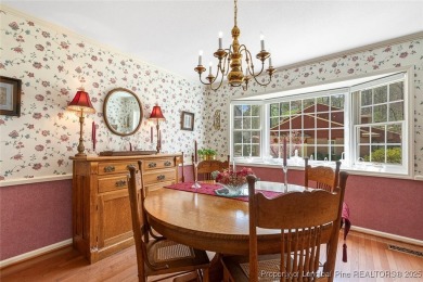 Say *Welcome Home* to this adorable English cottage-style home on Carolina Trace Country Club in North Carolina - for sale on GolfHomes.com, golf home, golf lot