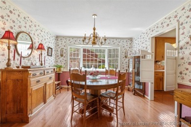 Say *Welcome Home* to this adorable English cottage-style home on Carolina Trace Country Club in North Carolina - for sale on GolfHomes.com, golf home, golf lot
