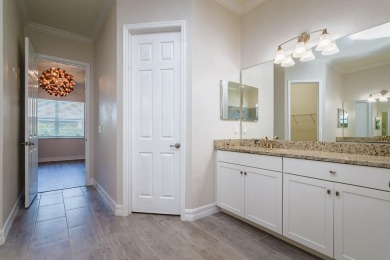 WELCOME TO THIS SOUGHT-AFTER SUMMERVILLE MODEL! This 3-bedroom on Esplanade Golf and Country at Lakewood Ranch in Florida - for sale on GolfHomes.com, golf home, golf lot