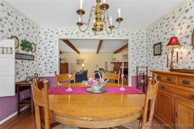 Say *Welcome Home* to this adorable English cottage-style home on Carolina Trace Country Club in North Carolina - for sale on GolfHomes.com, golf home, golf lot
