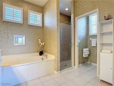 This beautifully maintained Sandpiper home in HERONS GLEN on Herons Glen Golf and Country Club in Florida - for sale on GolfHomes.com, golf home, golf lot