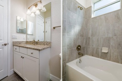 WELCOME TO THIS SOUGHT-AFTER SUMMERVILLE MODEL! This 3-bedroom on Esplanade Golf and Country at Lakewood Ranch in Florida - for sale on GolfHomes.com, golf home, golf lot