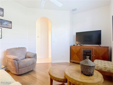 This beautifully maintained Sandpiper home in HERONS GLEN on Herons Glen Golf and Country Club in Florida - for sale on GolfHomes.com, golf home, golf lot