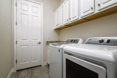 WELCOME TO THIS SOUGHT-AFTER SUMMERVILLE MODEL! This 3-bedroom on Esplanade Golf and Country at Lakewood Ranch in Florida - for sale on GolfHomes.com, golf home, golf lot