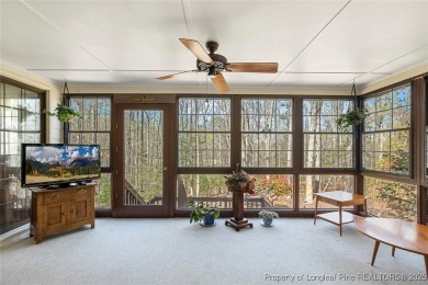 Say *Welcome Home* to this adorable English cottage-style home on Carolina Trace Country Club in North Carolina - for sale on GolfHomes.com, golf home, golf lot