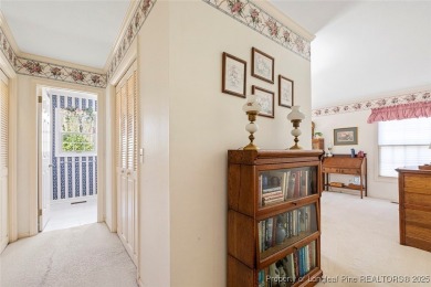 Say *Welcome Home* to this adorable English cottage-style home on Carolina Trace Country Club in North Carolina - for sale on GolfHomes.com, golf home, golf lot