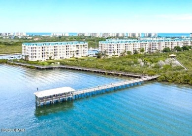 Bright and cheerful 3 bedroom corner unit overlooks marsh and on Harbour Village Golf and Yacht Club in Florida - for sale on GolfHomes.com, golf home, golf lot