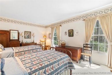 Say *Welcome Home* to this adorable English cottage-style home on Carolina Trace Country Club in North Carolina - for sale on GolfHomes.com, golf home, golf lot