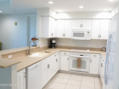 Bright and cheerful 3 bedroom corner unit overlooks marsh and on Harbour Village Golf and Yacht Club in Florida - for sale on GolfHomes.com, golf home, golf lot