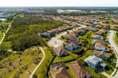 WELCOME TO THIS SOUGHT-AFTER SUMMERVILLE MODEL! This 3-bedroom on Esplanade Golf and Country at Lakewood Ranch in Florida - for sale on GolfHomes.com, golf home, golf lot