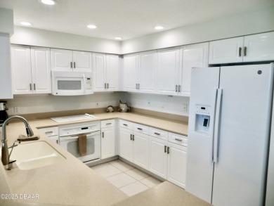 Bright and cheerful 3 bedroom corner unit overlooks marsh and on Harbour Village Golf and Yacht Club in Florida - for sale on GolfHomes.com, golf home, golf lot