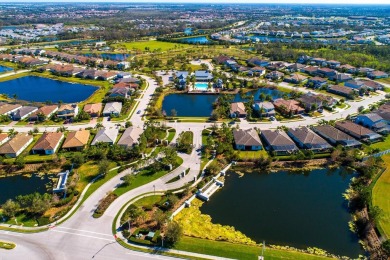 WELCOME TO THIS SOUGHT-AFTER SUMMERVILLE MODEL! This 3-bedroom on Esplanade Golf and Country at Lakewood Ranch in Florida - for sale on GolfHomes.com, golf home, golf lot