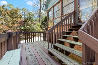 Say *Welcome Home* to this adorable English cottage-style home on Carolina Trace Country Club in North Carolina - for sale on GolfHomes.com, golf home, golf lot