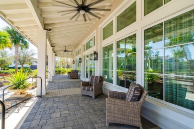 WELCOME TO THIS SOUGHT-AFTER SUMMERVILLE MODEL! This 3-bedroom on Esplanade Golf and Country at Lakewood Ranch in Florida - for sale on GolfHomes.com, golf home, golf lot