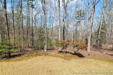 Say *Welcome Home* to this adorable English cottage-style home on Carolina Trace Country Club in North Carolina - for sale on GolfHomes.com, golf home, golf lot