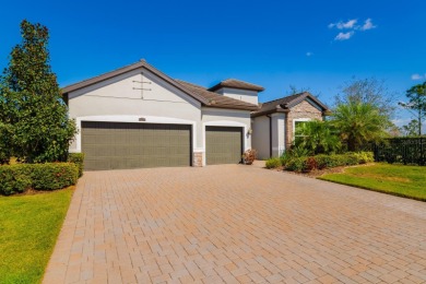 WELCOME TO THIS SOUGHT-AFTER SUMMERVILLE MODEL! This 3-bedroom on Esplanade Golf and Country at Lakewood Ranch in Florida - for sale on GolfHomes.com, golf home, golf lot