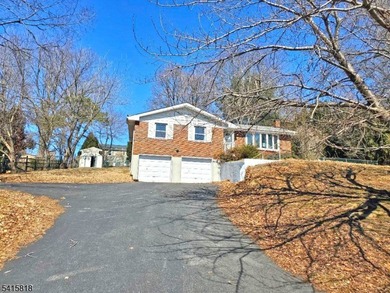 THIS RANCH BOASTS AN OPEN FLOOR PLAN WITH THE FORMAL LIVING ROOM on High Bridge Hills Golf Club in New Jersey - for sale on GolfHomes.com, golf home, golf lot