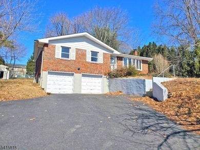 THIS RANCH BOASTS AN OPEN FLOOR PLAN WITH THE FORMAL LIVING ROOM on High Bridge Hills Golf Club in New Jersey - for sale on GolfHomes.com, golf home, golf lot