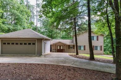 Welcome to your ideal lakefront retreat in the highly desirable on Holly Lake Ranch Golf Club in Texas - for sale on GolfHomes.com, golf home, golf lot