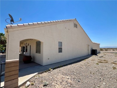 Situated gracefully between the 11th and 12th holes of the on Desert Lakes Golf Course in Arizona - for sale on GolfHomes.com, golf home, golf lot
