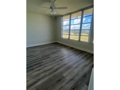 This beautifully remodeled 2-bedroom, 2-bath condo offers on Palm-Aire Country Club and Resort - Palms in Florida - for sale on GolfHomes.com, golf home, golf lot