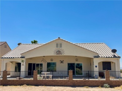 Situated gracefully between the 11th and 12th holes of the on Desert Lakes Golf Course in Arizona - for sale on GolfHomes.com, golf home, golf lot