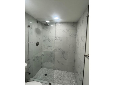 This beautifully remodeled 2-bedroom, 2-bath condo offers on Palm-Aire Country Club and Resort - Palms in Florida - for sale on GolfHomes.com, golf home, golf lot