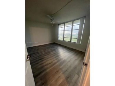 This beautifully remodeled 2-bedroom, 2-bath condo offers on Palm-Aire Country Club and Resort - Palms in Florida - for sale on GolfHomes.com, golf home, golf lot