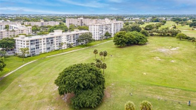 This beautifully remodeled 2-bedroom, 2-bath condo offers on Palm-Aire Country Club and Resort - Palms in Florida - for sale on GolfHomes.com, golf home, golf lot