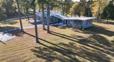 You need to take a look at this custom-built home with unique on Paris Golf and Country Club in Tennessee - for sale on GolfHomes.com, golf home, golf lot