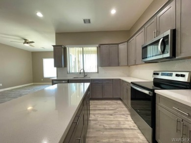 BEAUTIFUL TOWNHOME with BOAT DEEP GARAGE, TURNKEY, 2 BED, 2 BATH on Laughlin Ranch Golf Club in Arizona - for sale on GolfHomes.com, golf home, golf lot