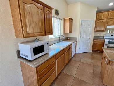 Situated gracefully between the 11th and 12th holes of the on Desert Lakes Golf Course in Arizona - for sale on GolfHomes.com, golf home, golf lot