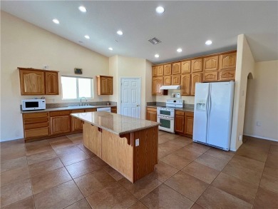 Situated gracefully between the 11th and 12th holes of the on Desert Lakes Golf Course in Arizona - for sale on GolfHomes.com, golf home, golf lot