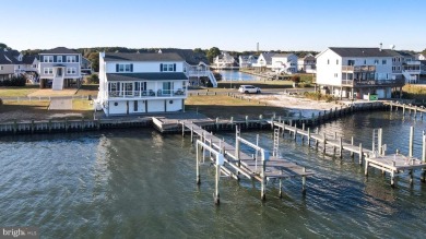 ABSOLUTE STUNNER!! Waterfront living on the Chincoteague Bay on Captains Cove Golf and Yacht Club in Virginia - for sale on GolfHomes.com, golf home, golf lot