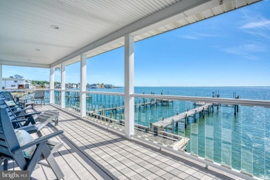 ABSOLUTE STUNNER!! Waterfront living on the Chincoteague Bay on Captains Cove Golf and Yacht Club in Virginia - for sale on GolfHomes.com, golf home, golf lot