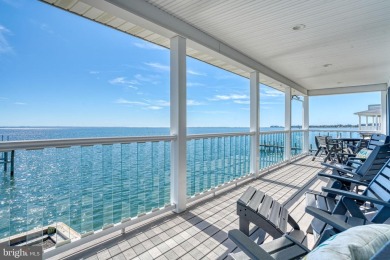 ABSOLUTE STUNNER!! Waterfront living on the Chincoteague Bay on Captains Cove Golf and Yacht Club in Virginia - for sale on GolfHomes.com, golf home, golf lot