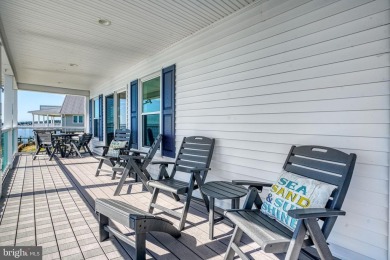 ABSOLUTE STUNNER!! Waterfront living on the Chincoteague Bay on Captains Cove Golf and Yacht Club in Virginia - for sale on GolfHomes.com, golf home, golf lot