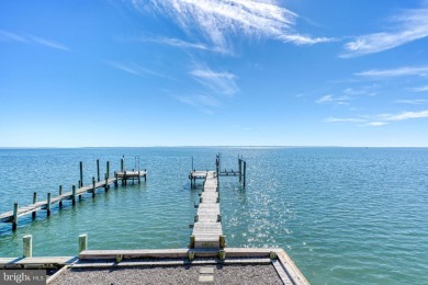 ABSOLUTE STUNNER!! Waterfront living on the Chincoteague Bay on Captains Cove Golf and Yacht Club in Virginia - for sale on GolfHomes.com, golf home, golf lot