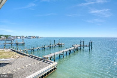 ABSOLUTE STUNNER!! Waterfront living on the Chincoteague Bay on Captains Cove Golf and Yacht Club in Virginia - for sale on GolfHomes.com, golf home, golf lot